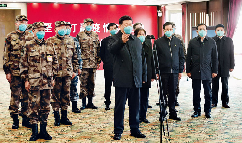2020年3月10日，中共中央总书记、国家主席、中央军委主席习近平专门赴湖北省武汉市考察新冠肺炎疫情防控工作。这是习近平在火神山开云官网入口app
指挥中心视频连线感染科病房，与病房内患者和医务人员亲切交流。